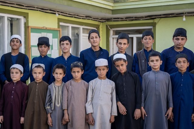 Children standing together in the courtyard