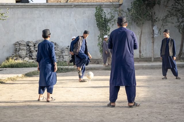 Children playing outdoors in the courtyard